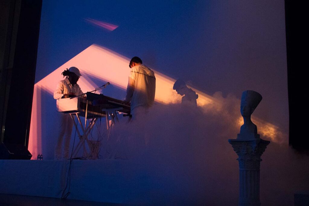 Projection onto performers and screen